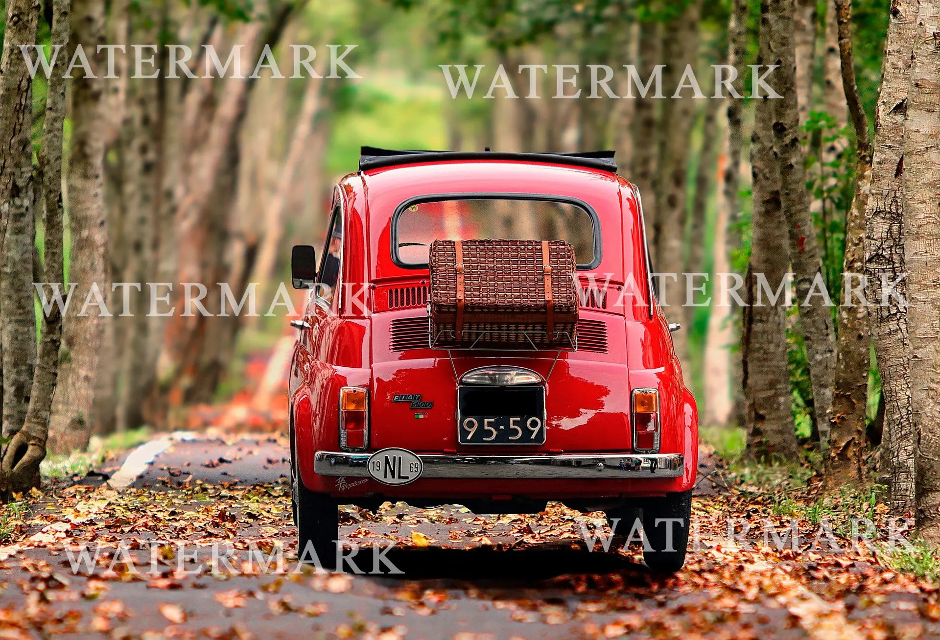 Red car with watermark signs.